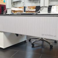 spannrahmen-leuchtrahmen-digitaldruck-büro-schreibtisch